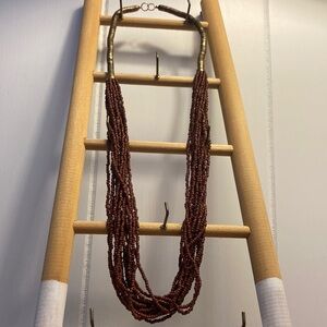 Brown Multi-Strand Beaded Necklace with Textured Design
